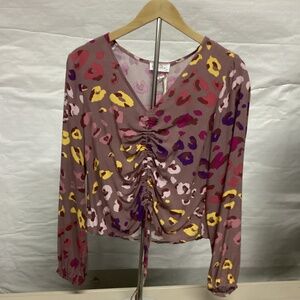 Emely Wonder leopard print long sleeve blouse.